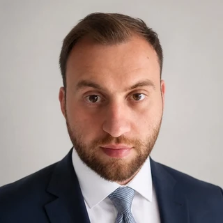 Руслан Алиев, к.э.н., MBA, MMA